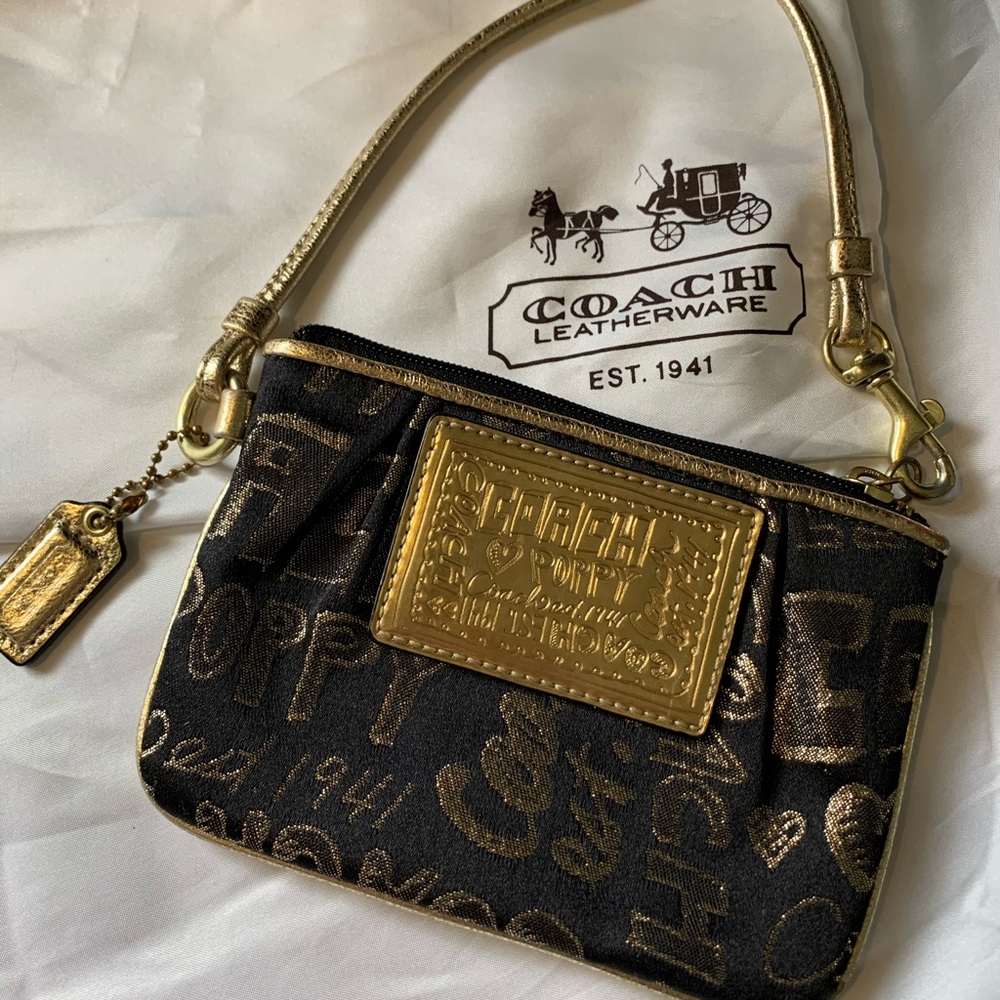 black and gold coach wristlet